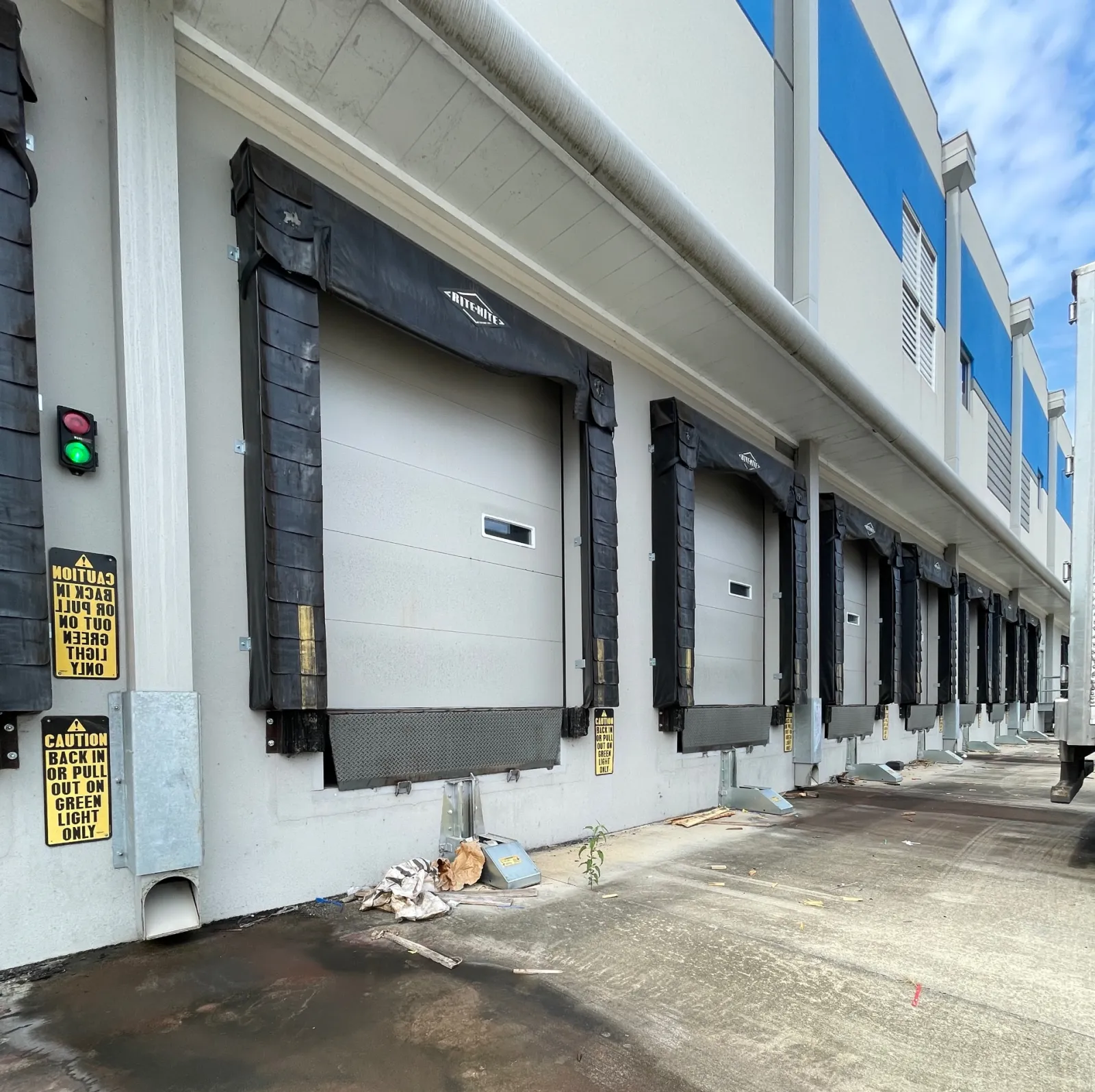 A series of loading docks at a commercial facility